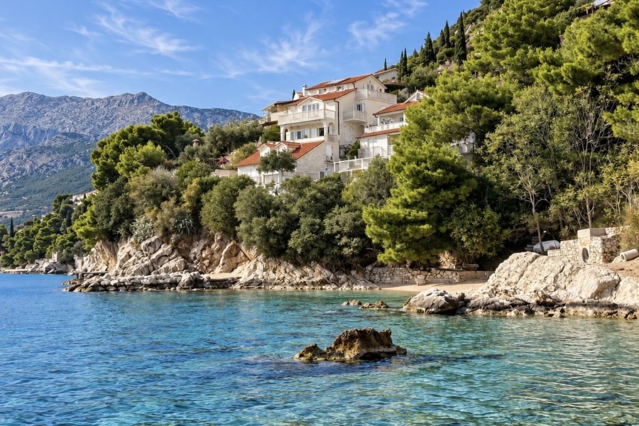 Coastline with the house above a swimming cove