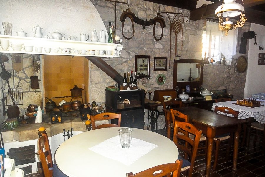 Konoba with old fireplace and dining tables