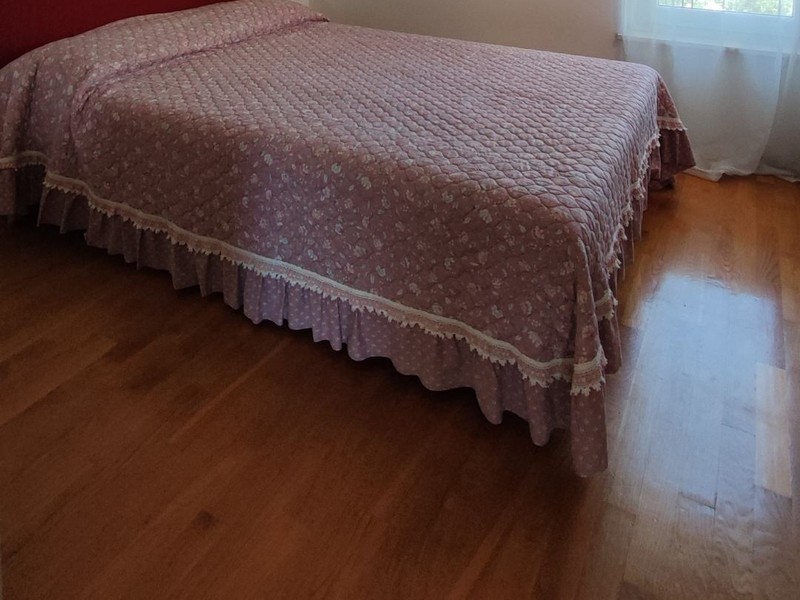 Bedroom with wooden floor