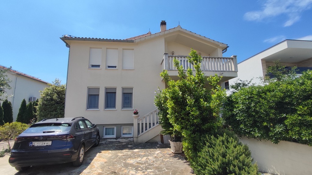 Front of the house with access road