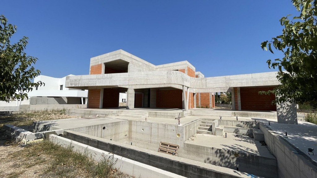 Shell of the villa with curved concrete roof