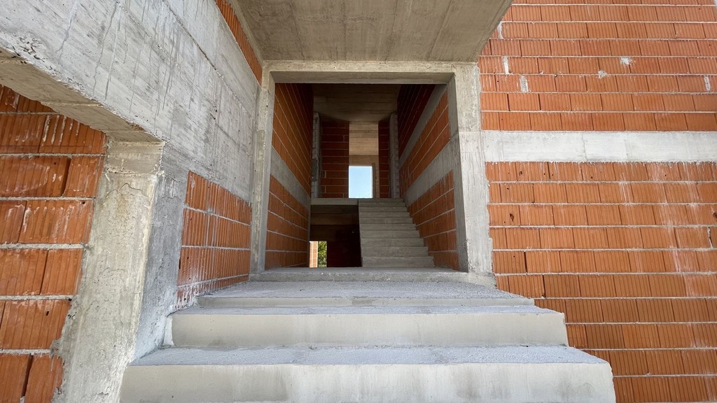 Staircase between floors in shell condition