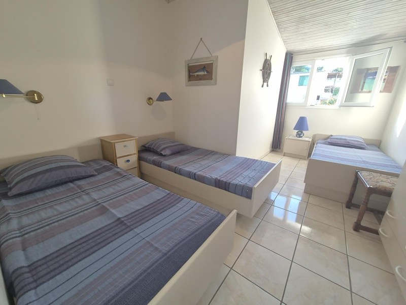Bedroom with three single beds