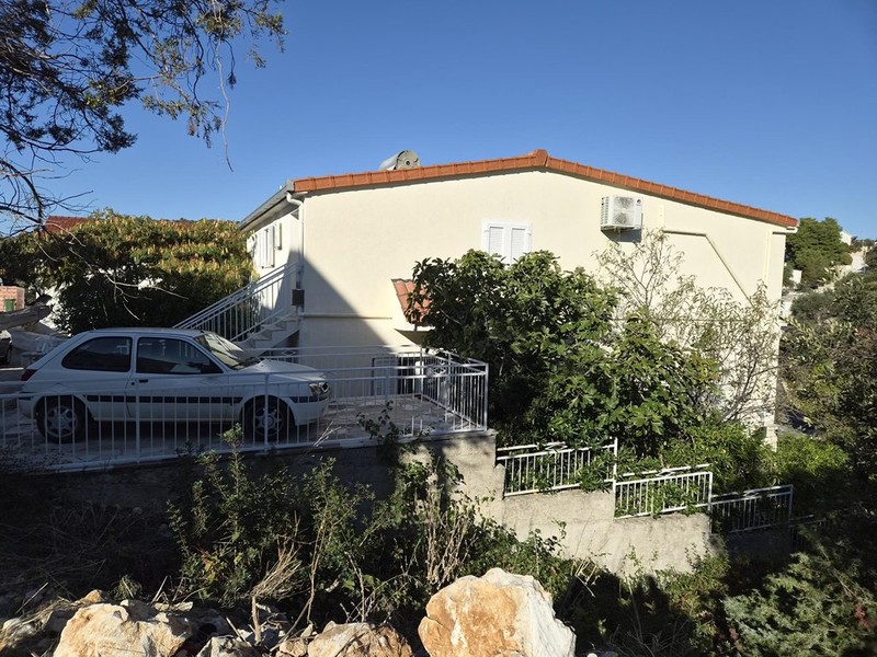 Side view of the house with access road