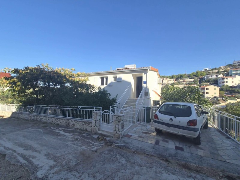 Access road with steps leading to the house
