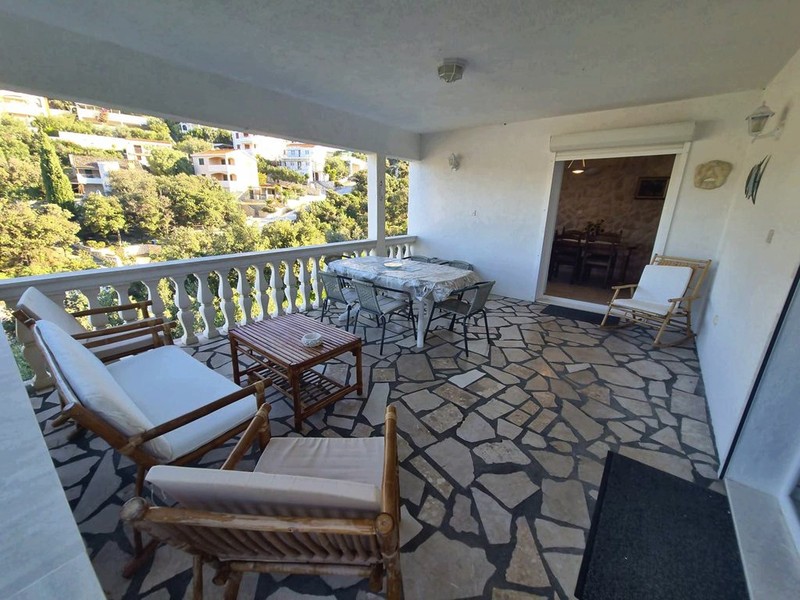 Terrace with outdoor furniture in front of the living area