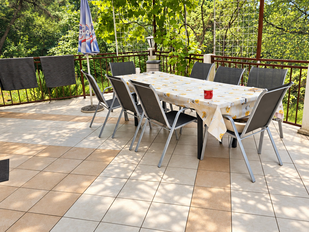 Terrace with pergola and dining table