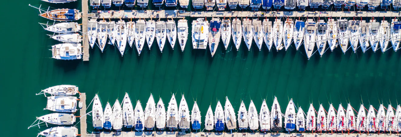 Aerial view of a marina in Croatia with sailing boats at the jetties
