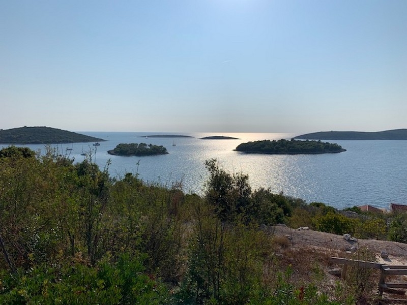 Crystal clear water and non -overcrowded beaches in the small town of the building plot