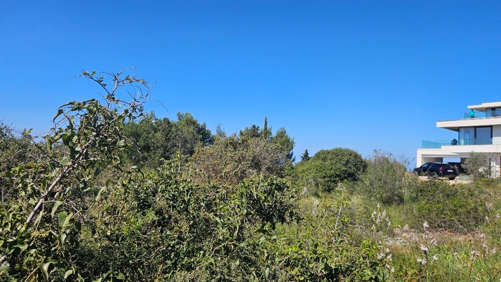 Property with modern neighboring buildings in Diklo