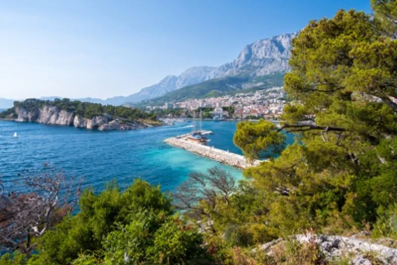 View of Makarska with its harbour and the Biokovo mountains in Dalmatia
